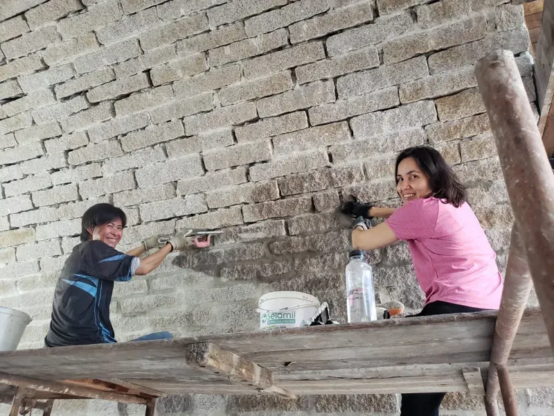 Building work day grouting stones at the Monastery