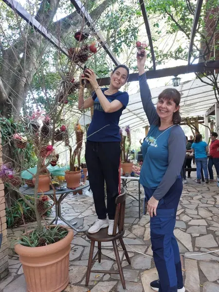 Members putting together an arrangement on Art Day