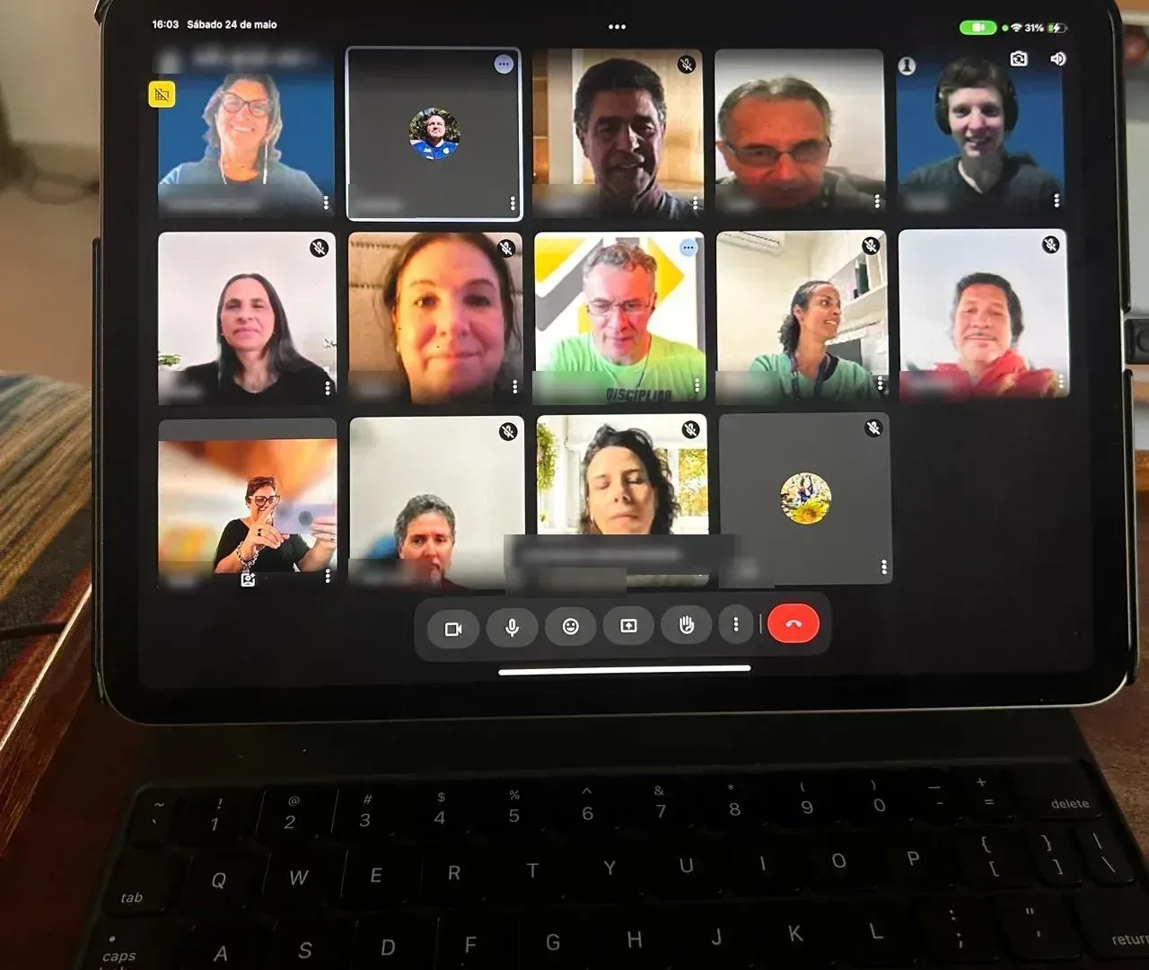Tablet showing an online members' meeting