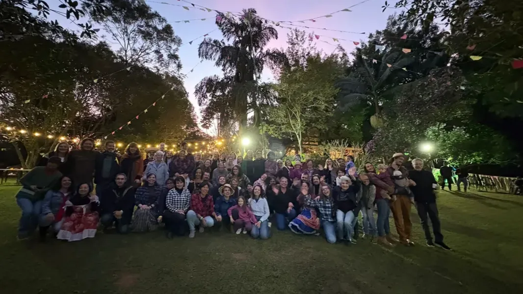 Group gathered at night at the Monastery's Festa Junina