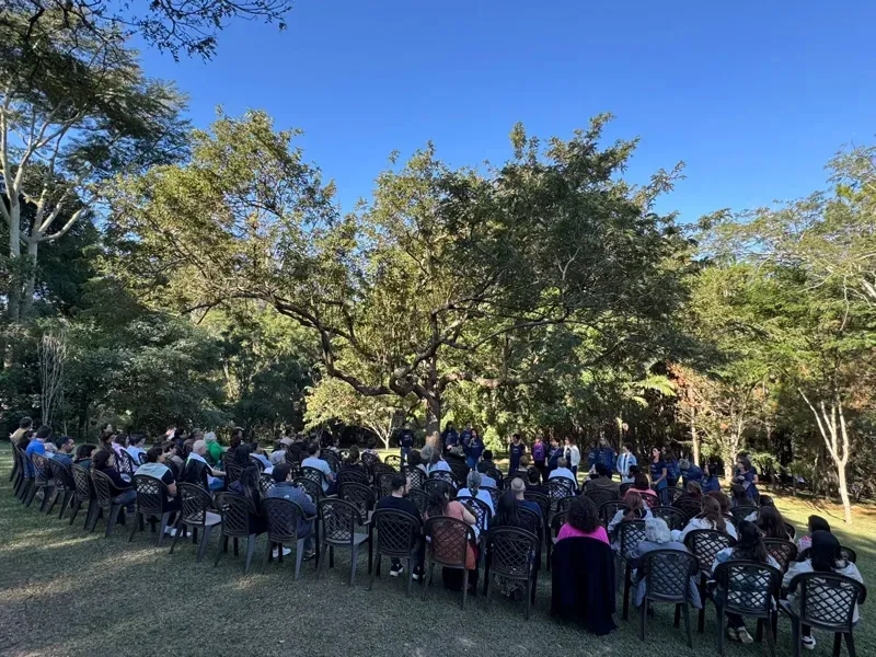 Laying on of Hands Day in a circle under the Monastery trees