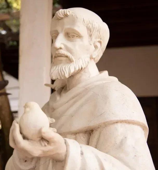 Statue of Saint Francis of Assisi holding a bird